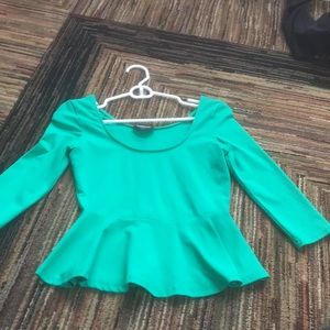 Bright green peplum top with 3/4 sleeves